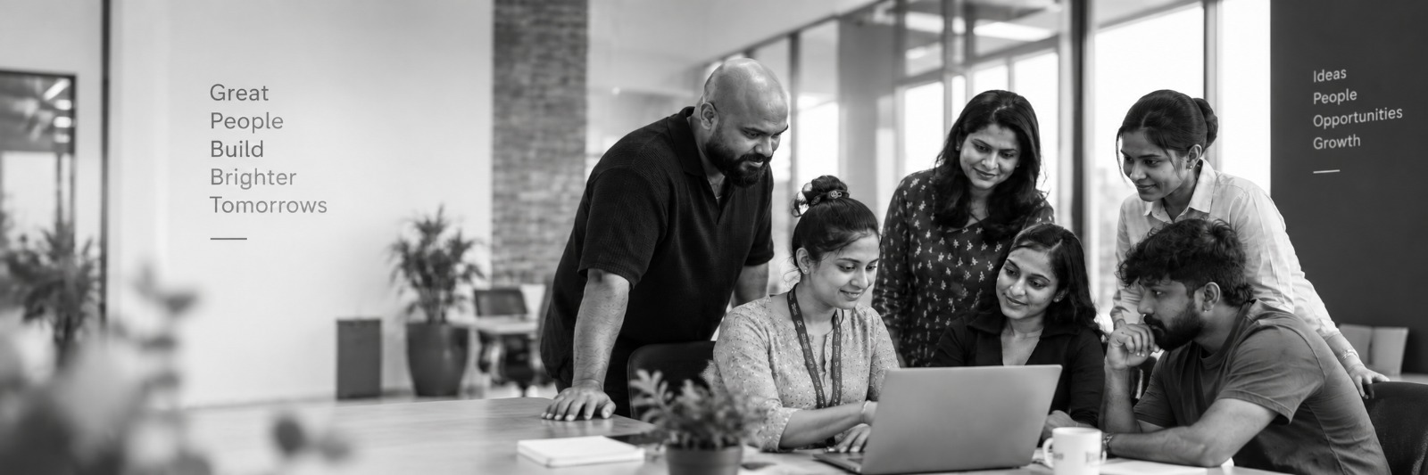 Blue Matrix team collaborating at a shared workspace